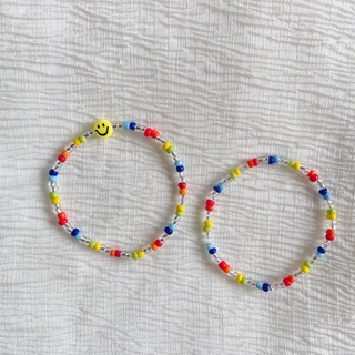 Vòng tay handmade cườm màu/hình mặt cười