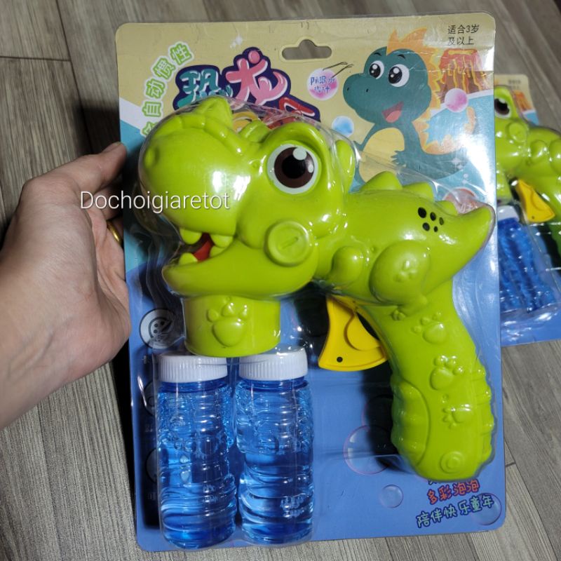 Đồ chơi súng bắn bong bóng khủng long xanh lá dùng cơ loại to, không dùng pin