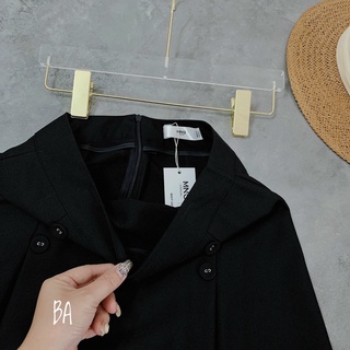 Chân váy xòe xếp li dáng lửng công sở