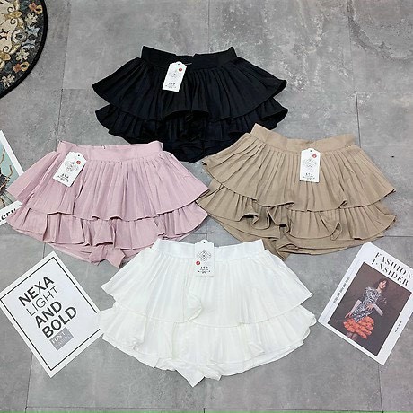 Chân váy 2 tầng xếp ly trơn cực xinh , chất tuyết mưa dày dặn