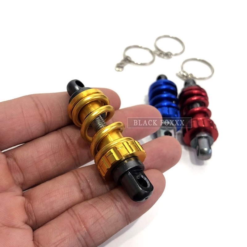 Móc khoá xe máy kiểu lò xo hình phuộc