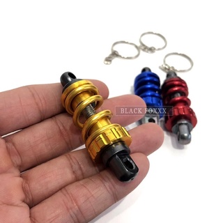 Móc khoá xe máy kiểu lò xo hình phuộc