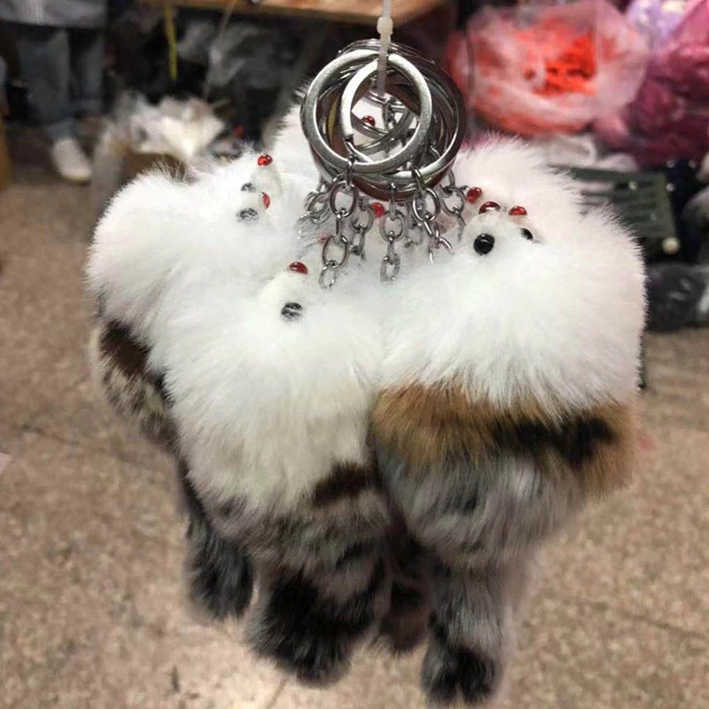 Quả cầu lông xù đáng yêu gắn móc khóa