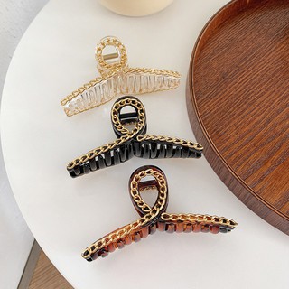 Kẹp tóc thương hiệu aroch jewelry hoạ tiết càng cua