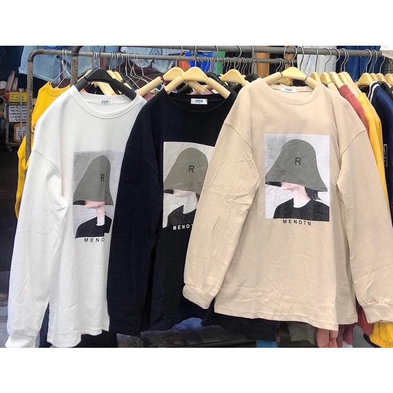 Áo phông dài tay cô gái đội mũ