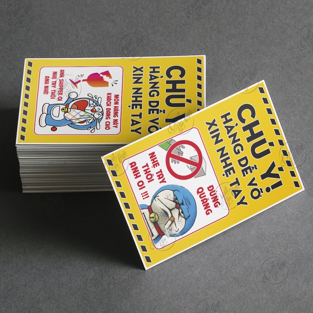 Combo 100 tem dán Chú Ý Hàng Dễ Vỡ Xin Nhẹ Tay nhẹ tai đô rê mon vui nhộn dán hộp hàng vận chuyển