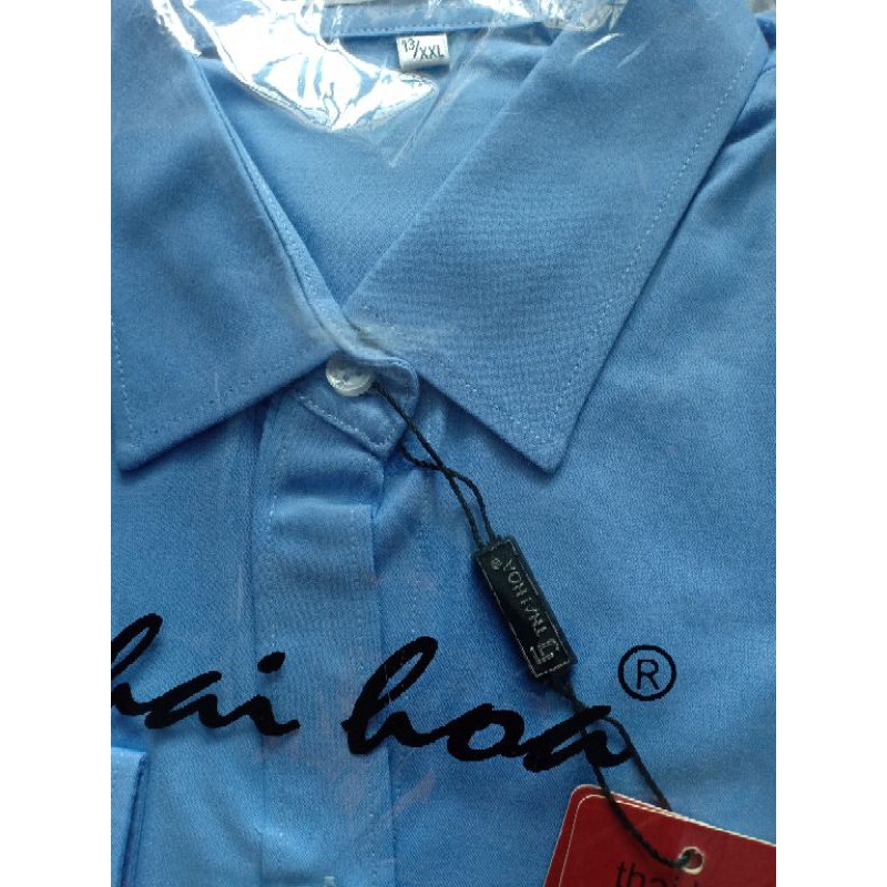 Áo sơ mi nữ Thái Hoà màu xanh dương vải sợi tre.