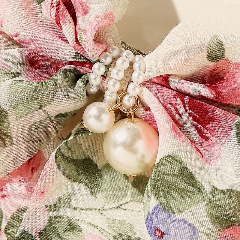 Kẹp Tóc Hình Nơ Đính Ngọc Trai Giả Dễ Thương Cho Nữ