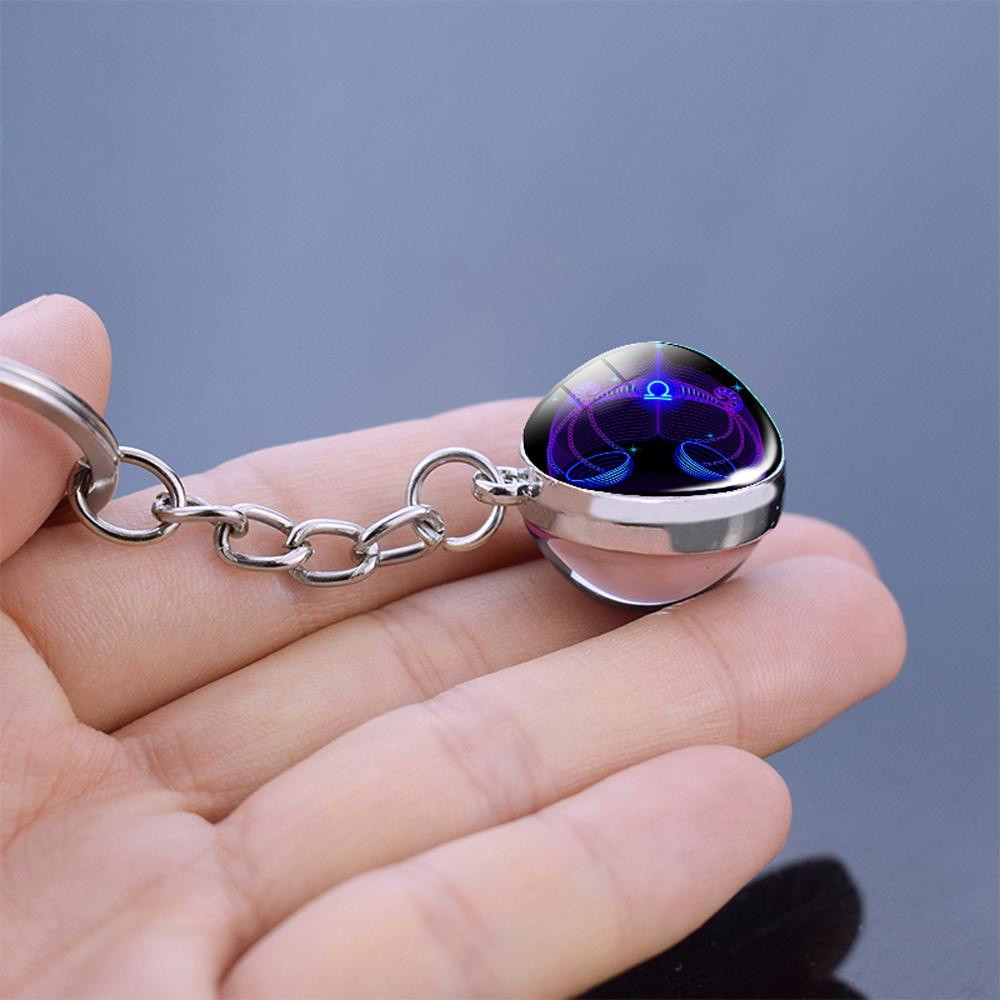 Móc Khóa Quả Cầu Thủy Tinh 12 Cung Hoàng Đạo Dạ Quang Hai Mặt Thời Trang Unisex