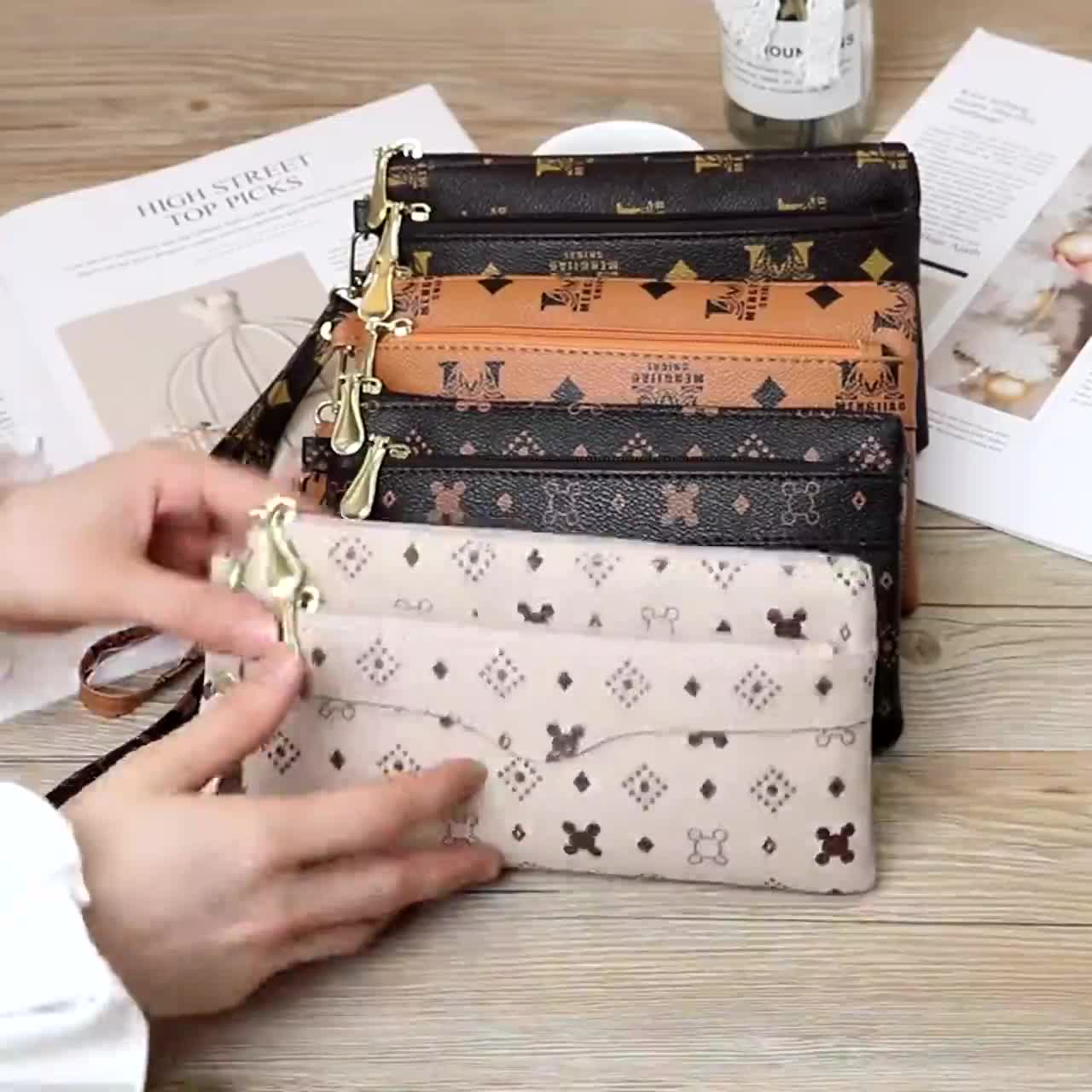 Ví cầm tay VLUX tiện ích