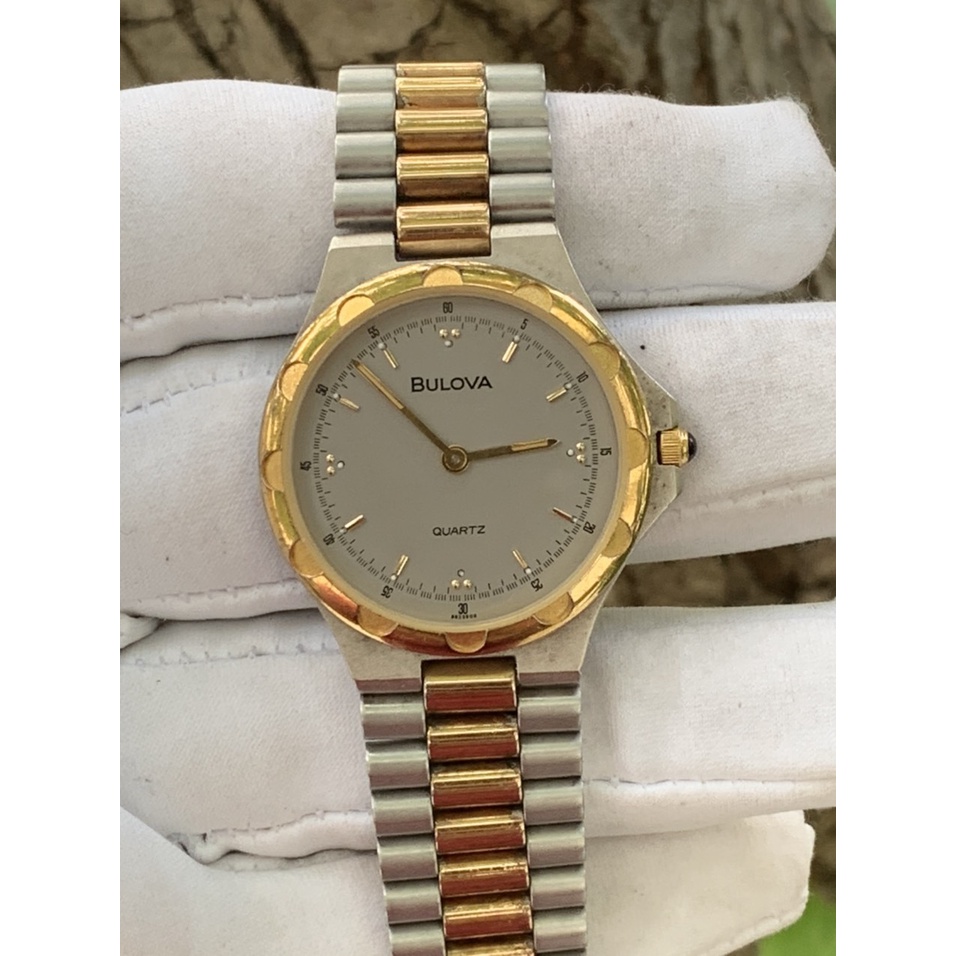 Đồng hồ nữ BULOVA Pin  niềng lắc kê vàng, dây kim loại của Thụy