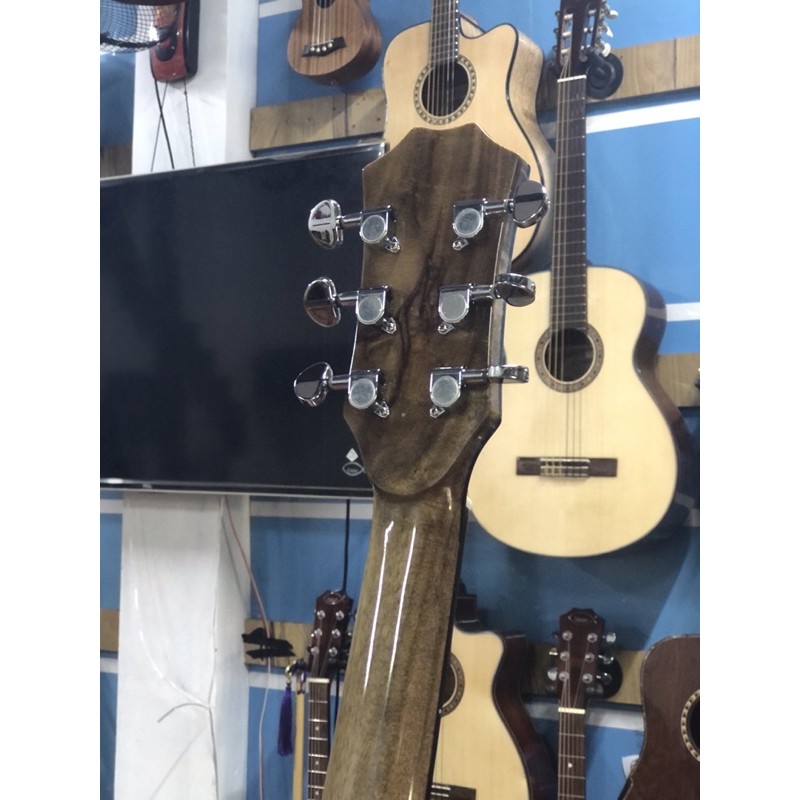 Đàn guitar toàn bộ là gỗ Tràm. guitar isaac Việt Nam tại Hà Nội