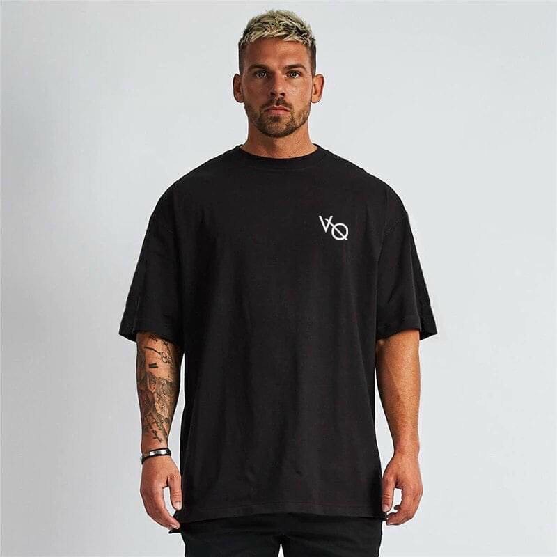 Áo thun nam unisex tay lỡ form rộng in chữ VANQUISH vải cotton màu đen và trắng TOP Trending giá sỉ unisex