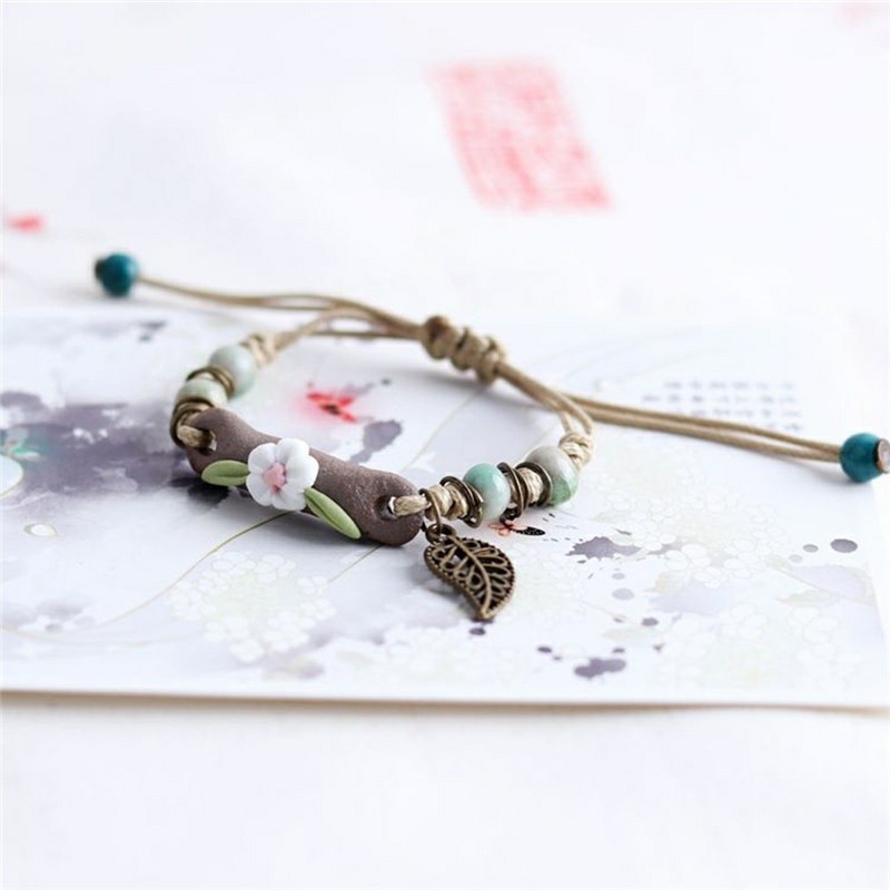 Vòng tay đất sét hoa charm chiếc lá