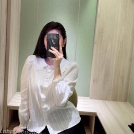 Sơ mi trắng cổ tròn tay bèo chất đũi mềm