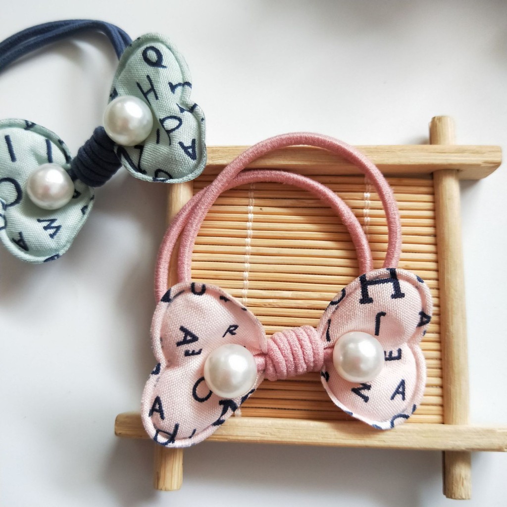 Dây buộc tóc cột tóc chấm bi cánh bướm kèm hạt châu cho bạn gái