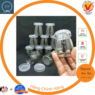 Hũ(lọ) sữa chua thuỷ tinh trắng có nắp nhựa 100 ml.