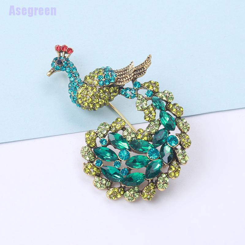 Ghim cài áo hình chim công đính đá xanh lá thời trang
