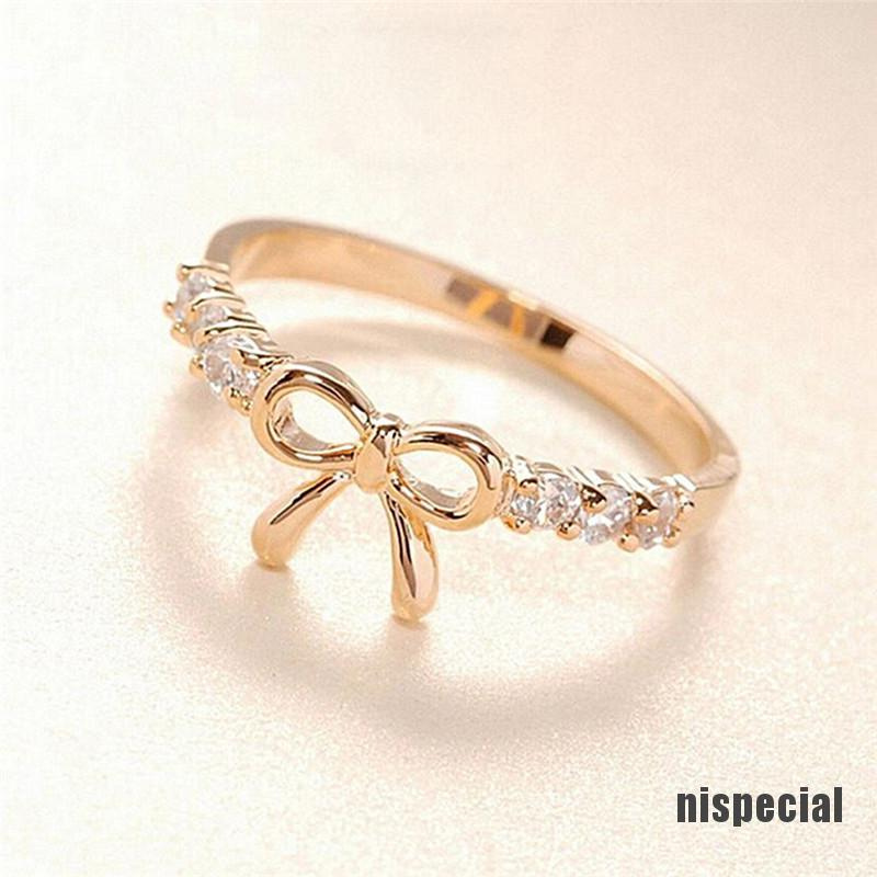 Nhẫn đeo ngón tay thiết kế mặt nơ đính đá pha lê nhân tạo phong cách đơn giản thời trang quyến rũ dành cho nữ