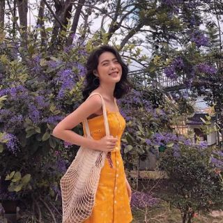Đầm vàng 2 dây hoa cúc