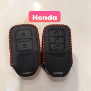 Bao da khóa bấm ô tô