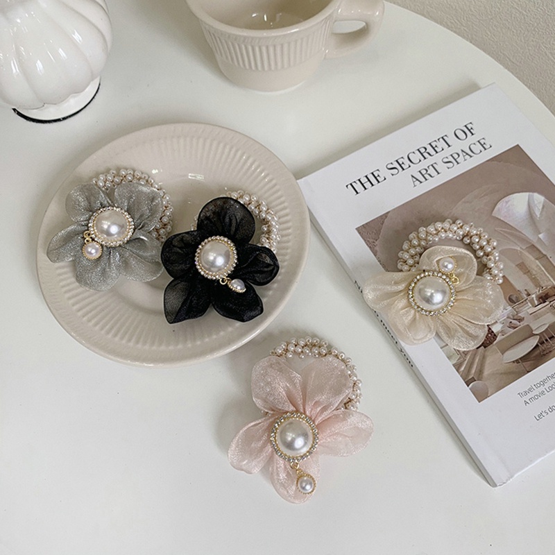 Dây Cột Tóc Co Giãn Đính Hoa Hướng Dương Và Ngọc Trai Xinh Xắn