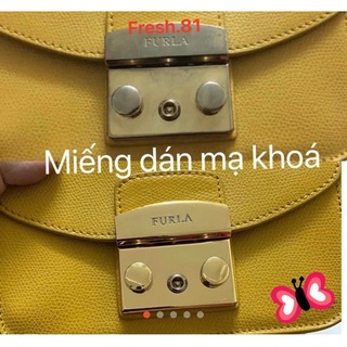 Miếng dán khoá mạ vàng fl m.e.t.r.o