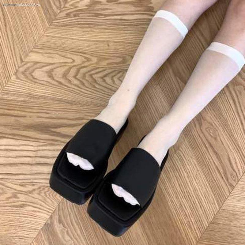 Black wedge platform flip-flops