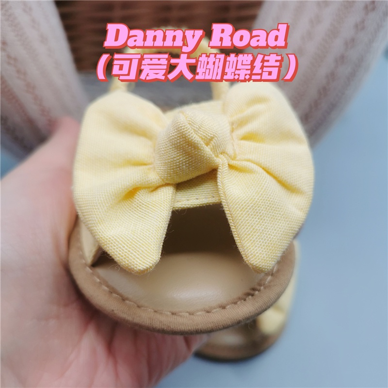 Giày sandal tập đi đính nơ chất liệu vải chống trượt xinh xắn thời trang mùa hè dành cho bé gái sơ sinh