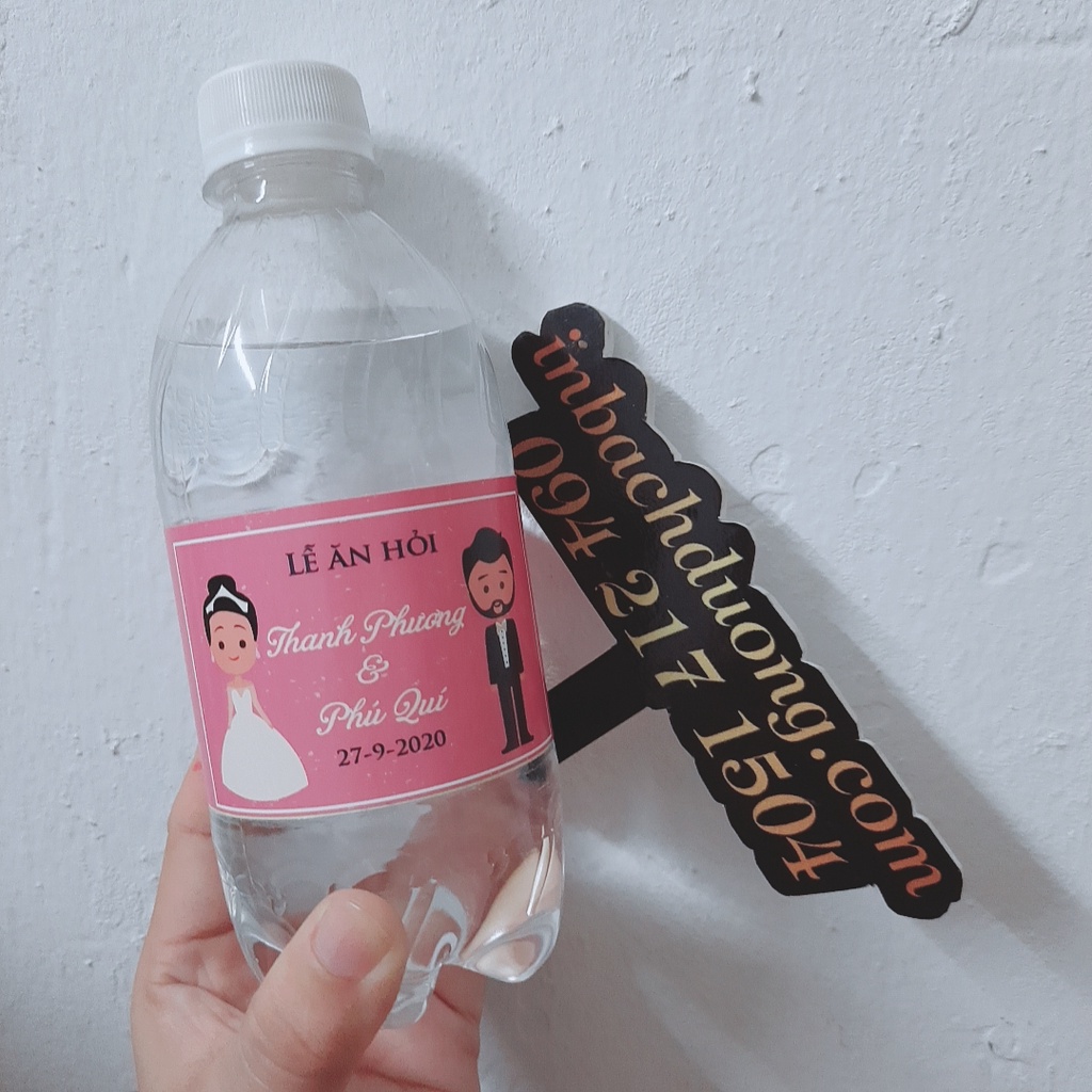 Tem cưới dán chai nước suối  -In Bạch Dương