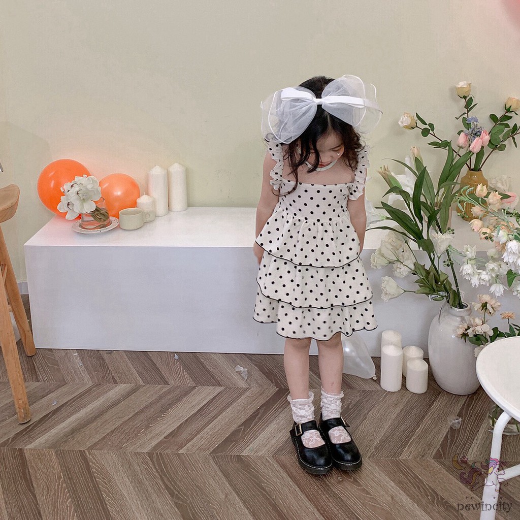 Đầm Công Chúa Không Tay Họa Tiết Chấm Bi Phối Bèo Phong Cách Hàn Quốc Cho Bé Gái