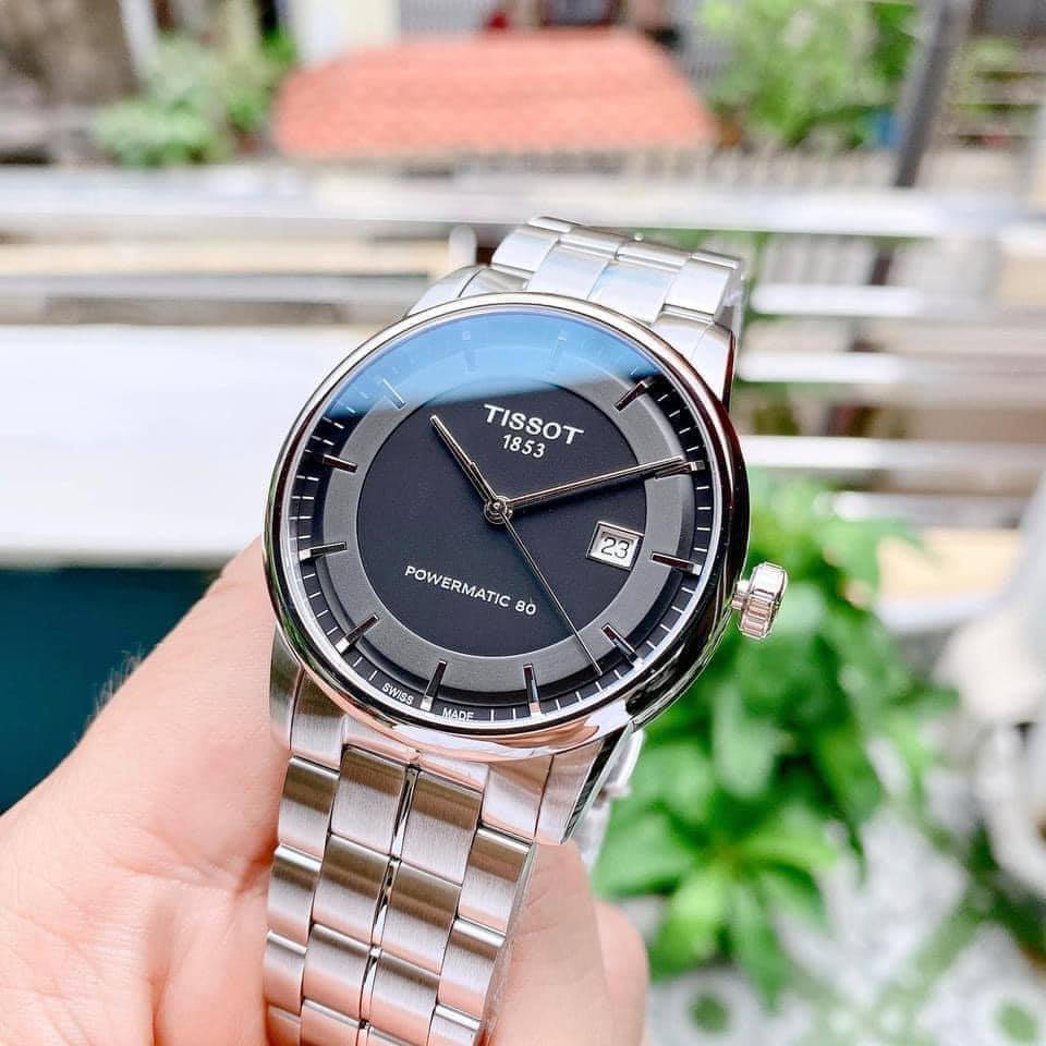 Đồng hồ nam Tissot T0864071105100 dây bạc, mặt đen, máy automatic