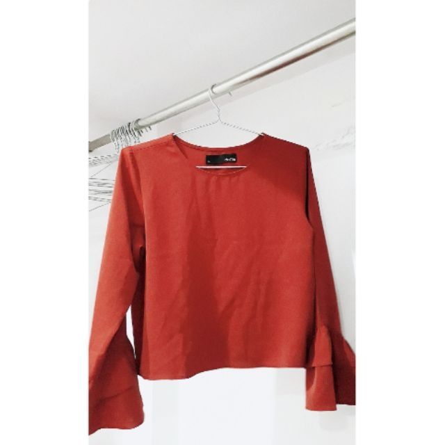 Áo Dottie cam đất