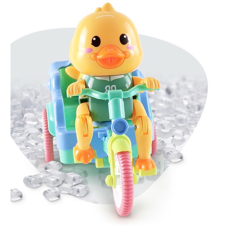 Đồ chơi vịt đạp xe có đàn nhạc vui nhộn bánh xe phát sáng - vịt chạy xe nhựa an toàn cho bé