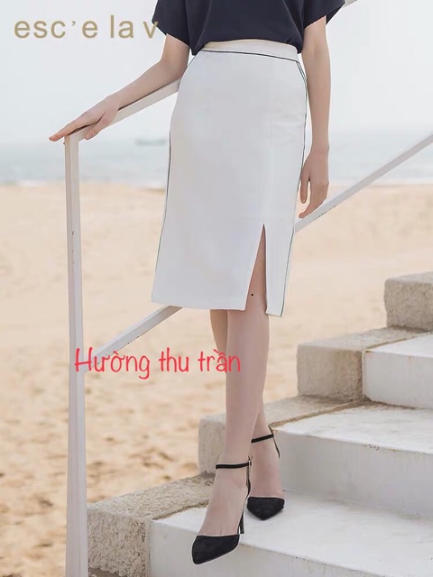 Chân váy công sở dáng suông sẻ trước có túi trẻ trung | BigBuy360 - bigbuy360.vn
