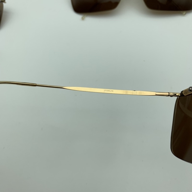 Kính amor cổ pháp bọc vàng