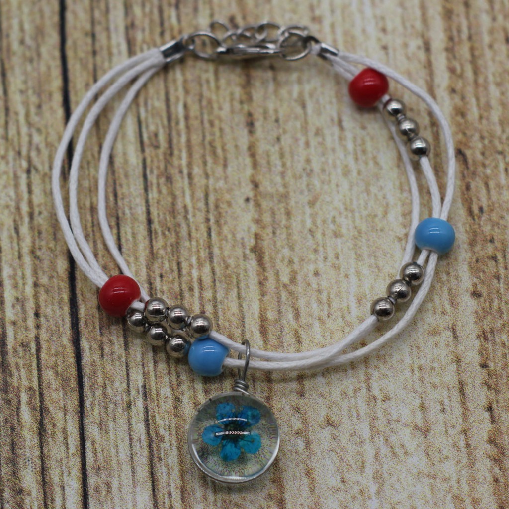 VT63 Vòng tay hạt gốm mặt hoa cúc 5 cái/lốc