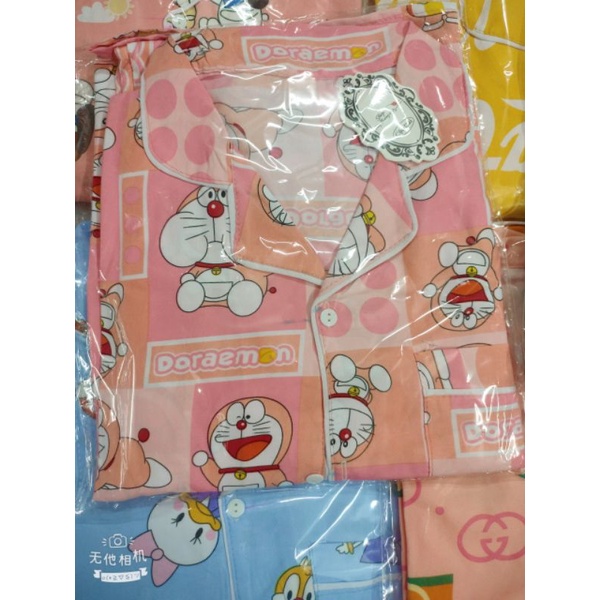 Bộ pyjama Kate tay cộc quần dài mịn mát.