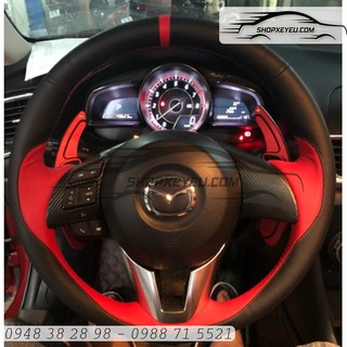 Da bọc vô lăng mazda đời facelift