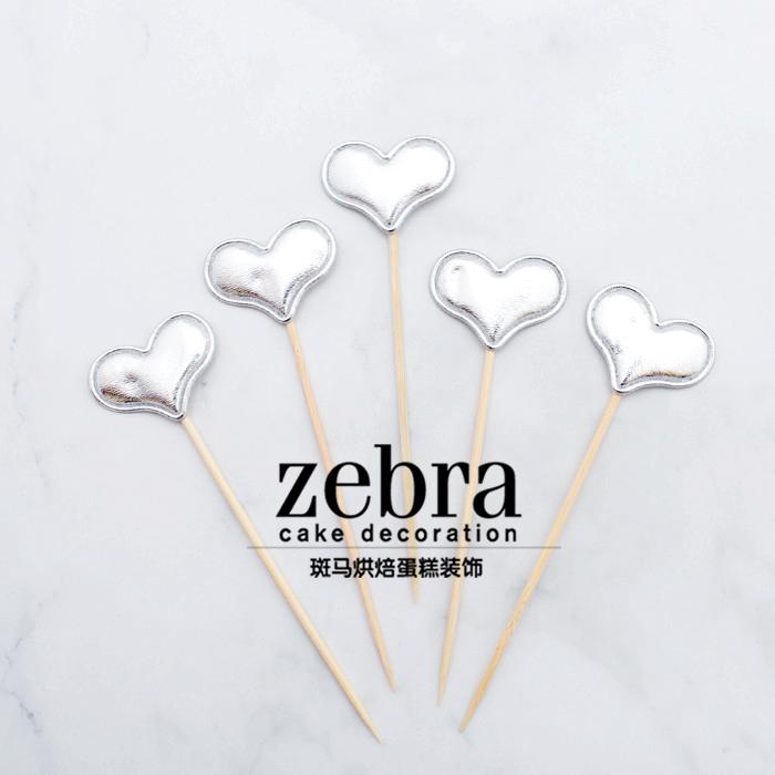Que cắm tim bóng bạc