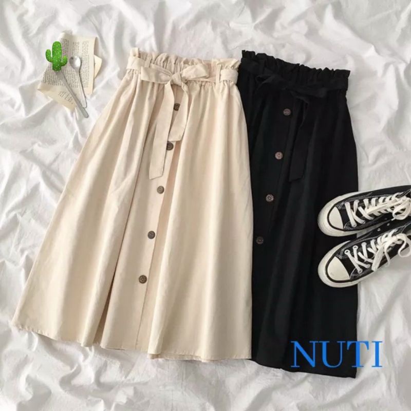 chân váy nhún eo phối nút cột nơ siêu xinh(B.C)