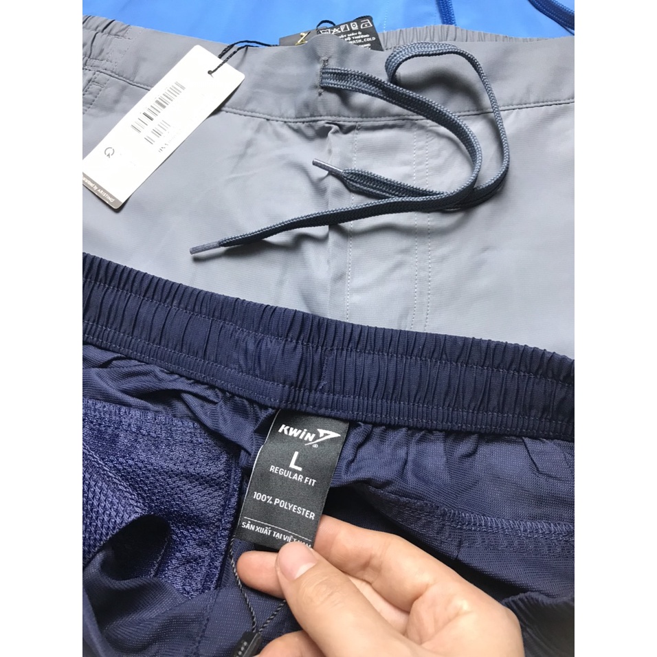 Quần short gió thể thao nam Kwin một nửa cạp chun , có dây rút 4 màu nam tính, chất chống nhăn thoáng mát - KSO002S1