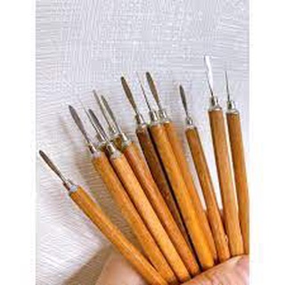 Đẩy da lấy khóe gỗ ,hàng chuẩn loại 1- lấy khóe móng cán gỗ