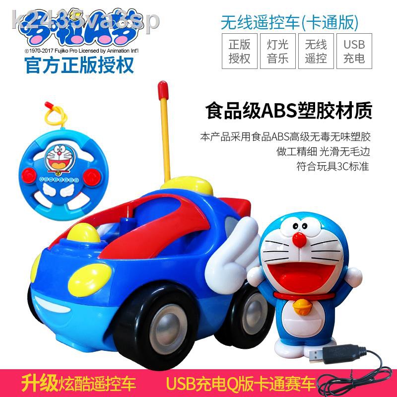 Trẻ em Doraemon hoạt hình ô tô điều khiển từ xa ô tô điều khiển từ xa đồ chơi Doraemon cậu bé âm nhạc ô tô điện trẻ em