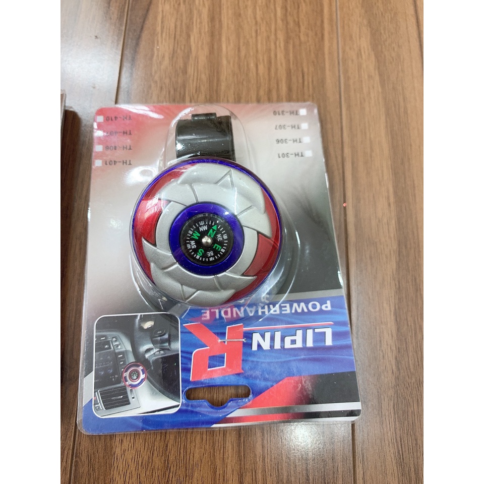 Núm xoay gắn vô lăng xe hơi điều khiển bằng tay sử dụng tiện lợi