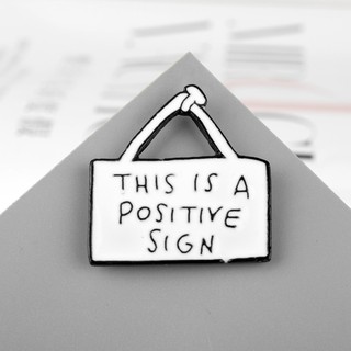 Huy hiệu cài áo " This is a Positive "