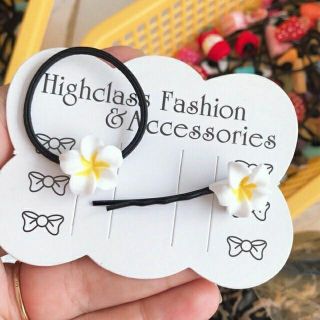 Túi 10 thun cột tóc hoa sứ trắng