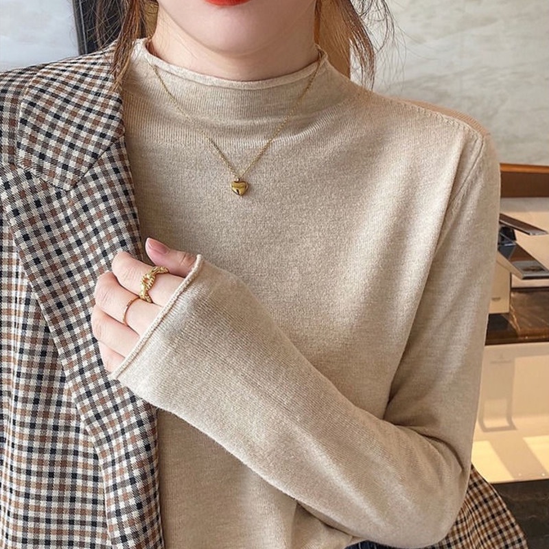 Áo sweater dệt kim cổ cao in màu đơn giản