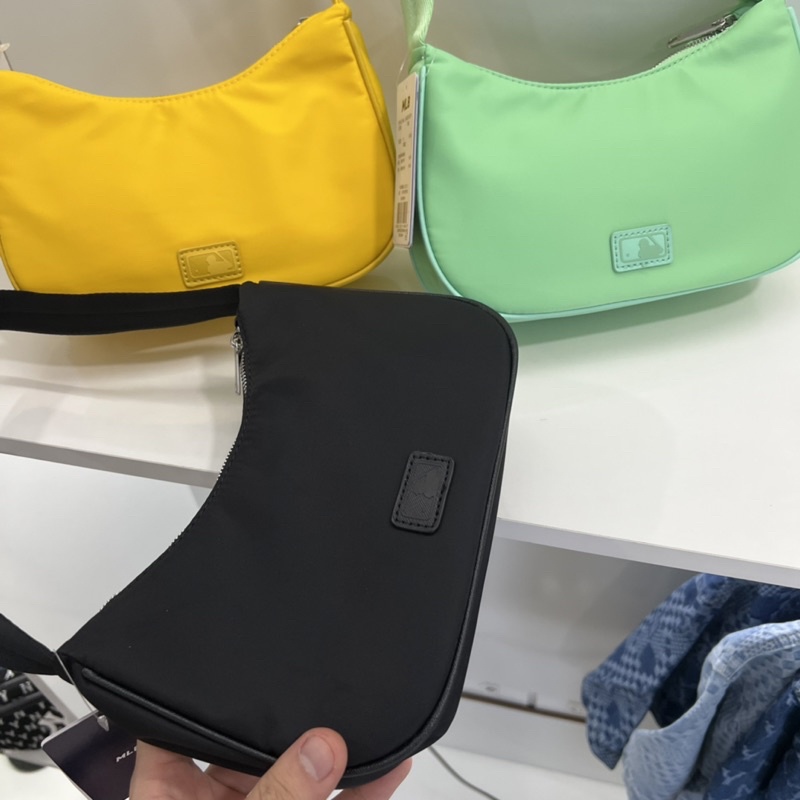 TÚI KẸP NÁCH VẢI M L N LOGO KIM LOẠI CAO CẤP TQXK