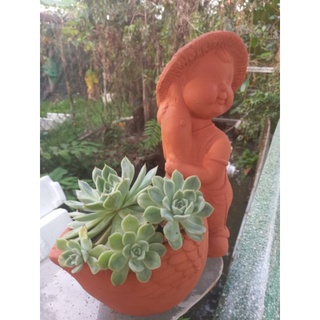 Chậu đất nung - chậu chàng trai ôm vịt